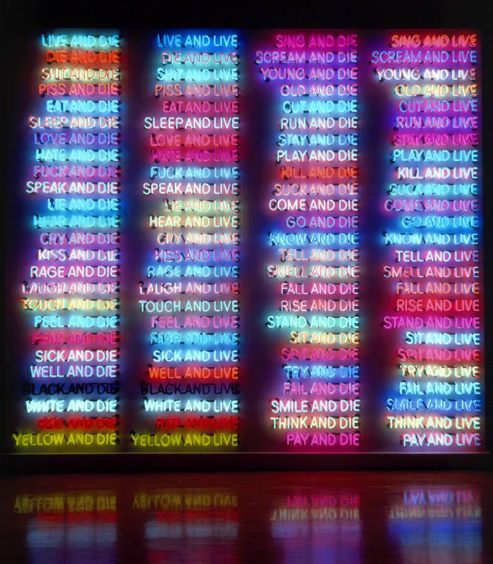 Bruce Nauman, “One Hundred Live and Die” (1984). Neon tubing with clear glass tubing on metal monolith 299.7 x 335.9 x 53.3. Collection Benesse Holdings, Inc./Benesse House Museum, Naoshima © Bruce Nauman / ARS, NY and DACS, London 2020, Courtesy Sperone Westwater, New York