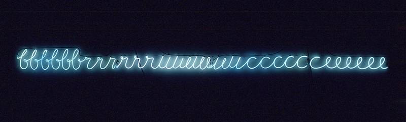 Bruce Nauman, “My Name As Though It Were Written on the Surface of the Moon” (1968). Neon tubing with clear glass tubing suspension frame, in four parts  279 x 5182 x 51 mm  Collection Stedelijk Museum Amsterdam © Bruce Nauman / ARS, NY and DACS, London 2020, Courtesy Sperone Westwater, New York