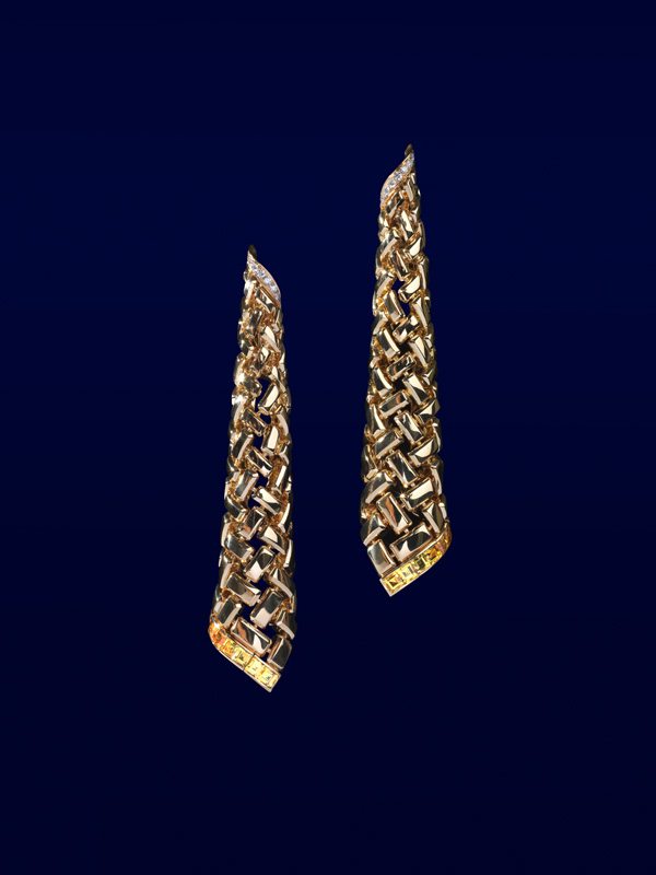 Boucles d’oreilles “Ondulation” en or jaune, serti de saphirs jaunes calibrés et de diamants taille brillant.