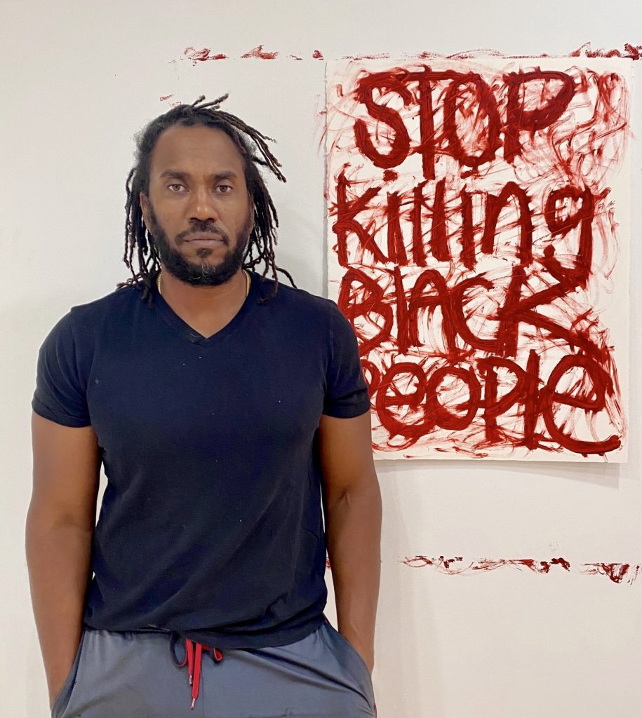 Rashid Johnson with his painting “Untitled” for the “Show Me the Signs” auction. Photo courtesy of the African American Policy Forum.