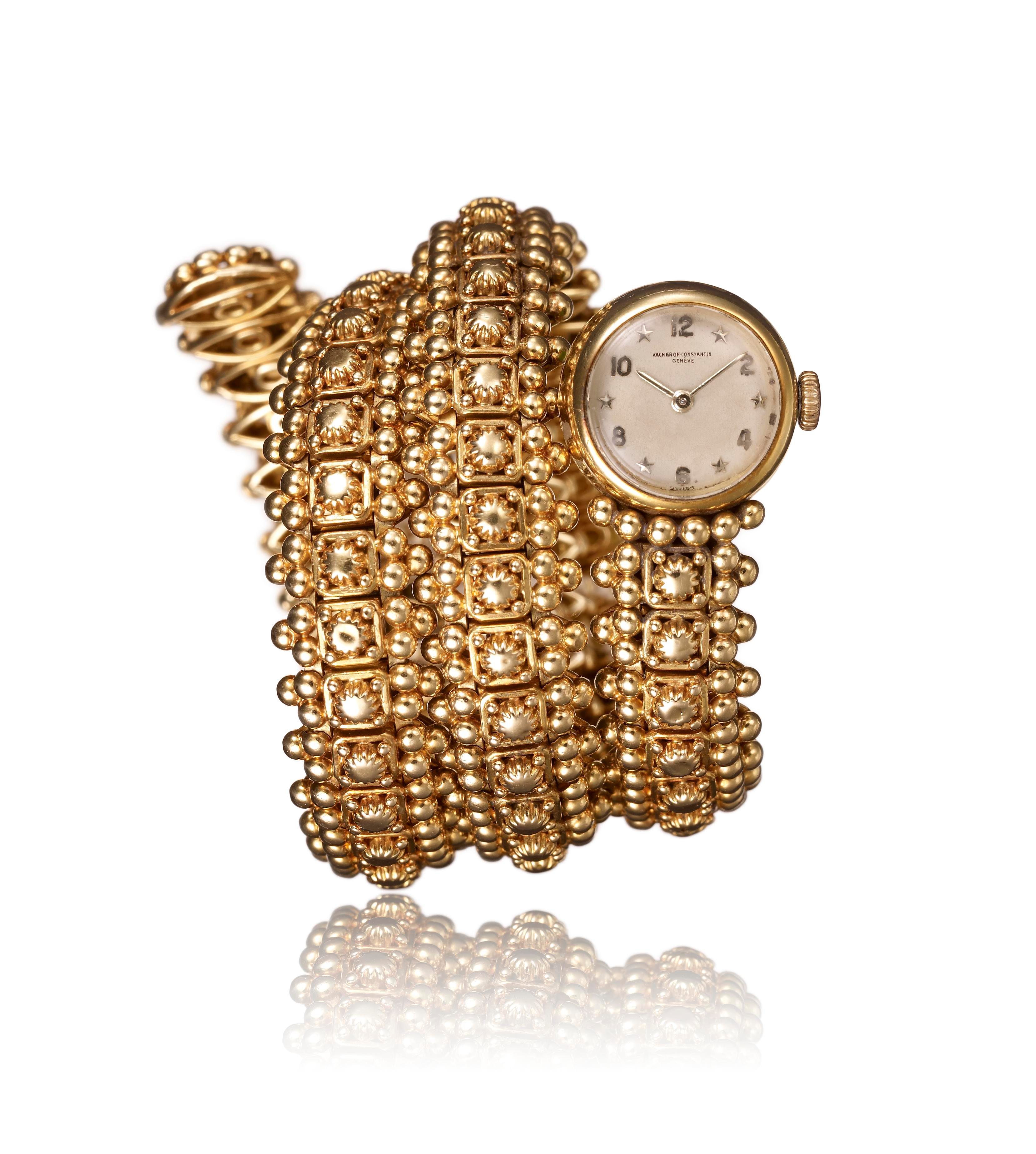Montre bracelet dame en or jaune bracelet trois tours - 1955