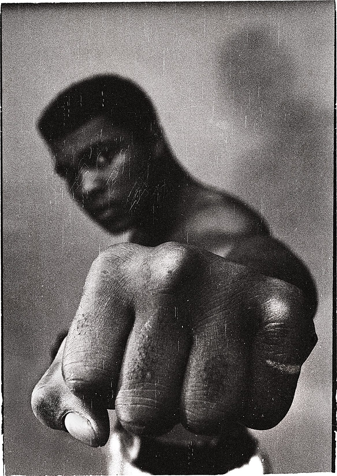 Muhammad Ali, world heavyweight champion showing off his left fist. Chicago, USA. 1966. Credit: THOMAS HOEPKER/MAGNUM PHOTOS 