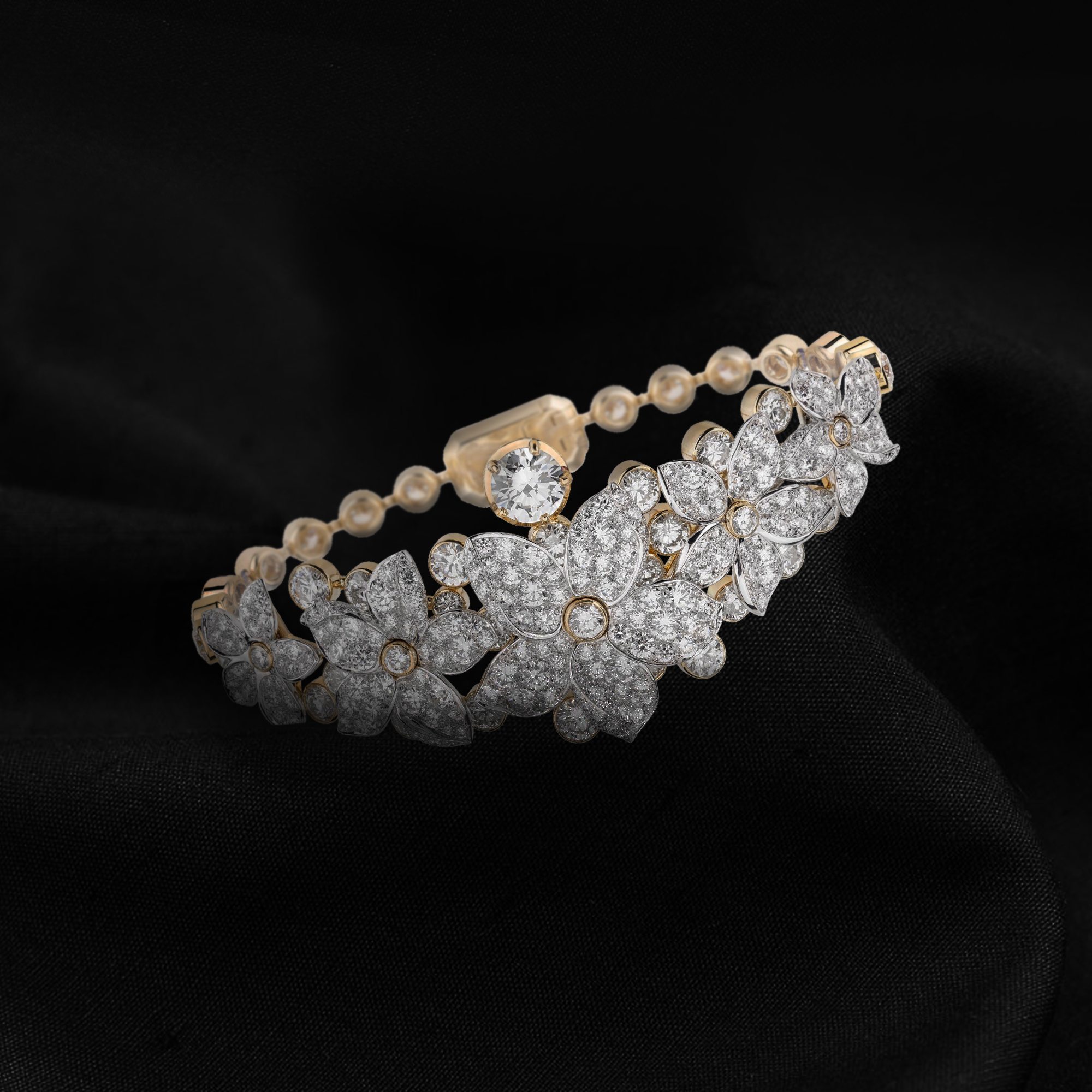 Bracelet GRASSE JASMINE en or blanc, or jaune et diamants. 1 diamant taille brillant 1,05 ct E VVS1.