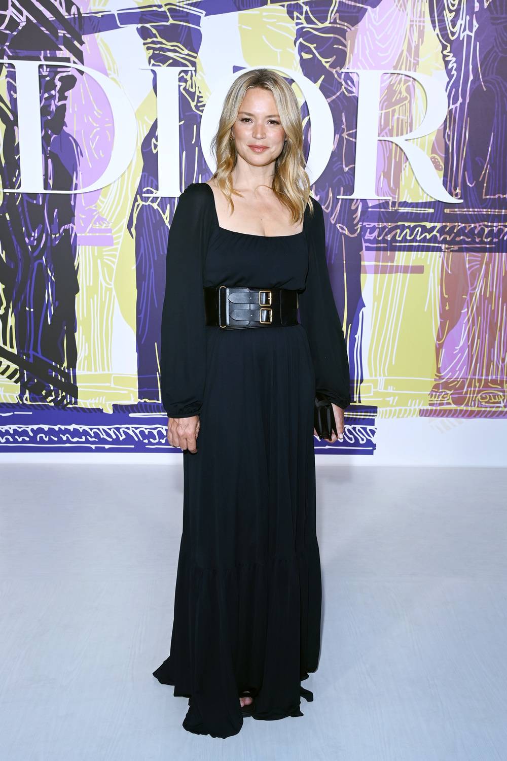 Virginie Efira wore a Dior Cruise 2021 black velvet long dress with a Dior black leather belt and Dior sandals.