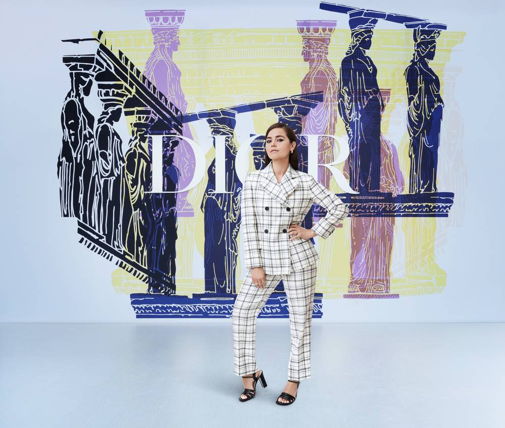 Jenna Coleman wore a Dior Pre Fall 2021 checkered white wool and silk suit with Dior sandals.