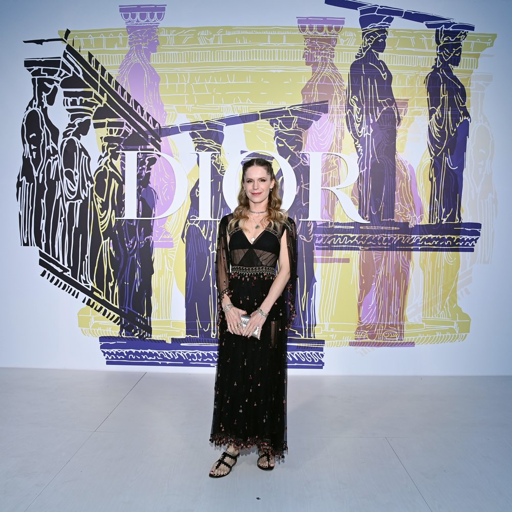 Eugenie Niarchos wore a Dior Cruise 2021 embroidered black tulle long dress with Dior sandals.
