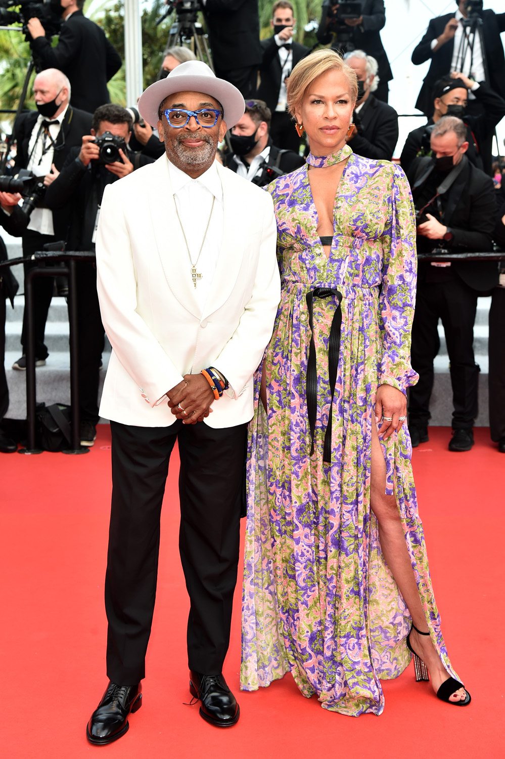 Spike Lee et Tonya Lewis Lee en costume et robe Louis Vuitton.
