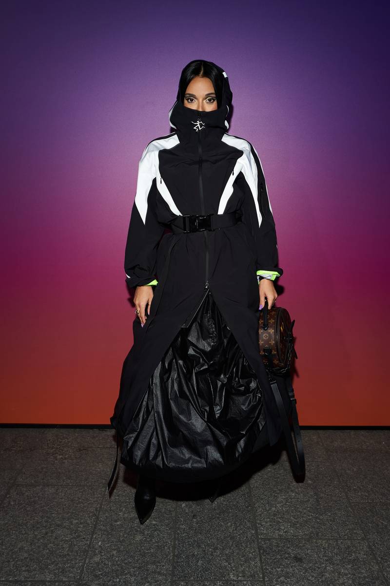 Amina Muaddi au défilé Louis Vuitton automne-hiver 2022-2023
