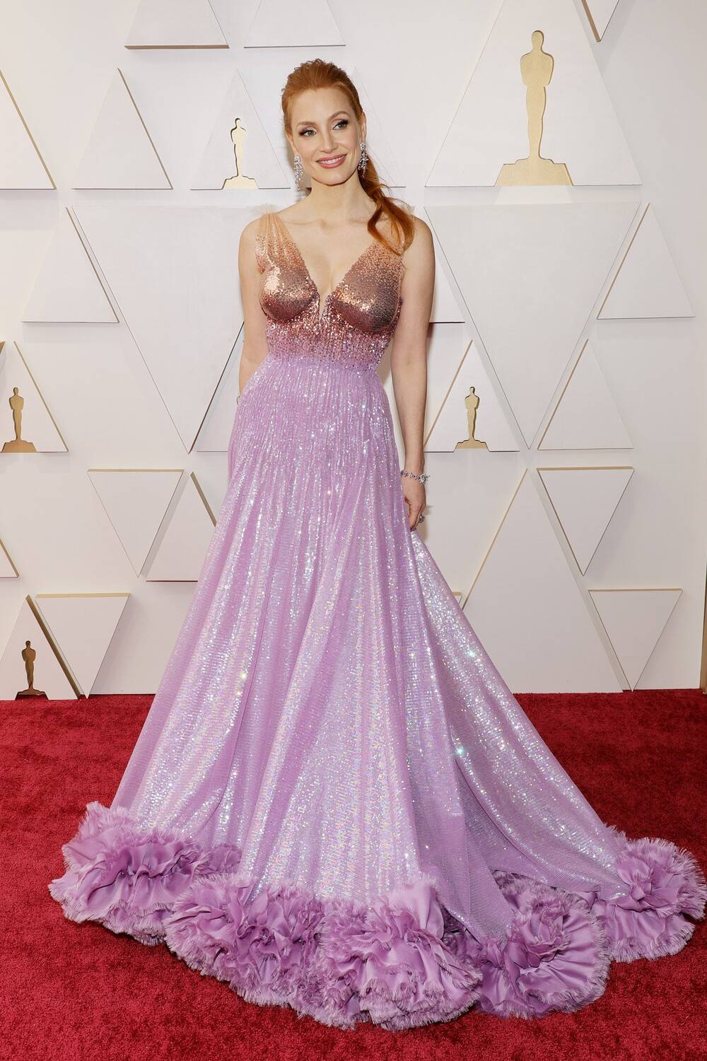 Jessica Chastain en robe et bijoux Gucci