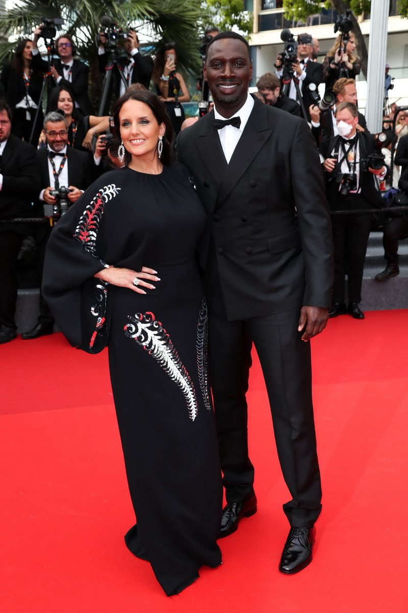 Omar et Hélène Sy en robe et costume Prada