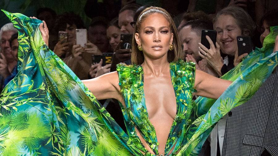 Jennifer Lopez wears the "jungle" dress at the Versace spring-summer 2020 show