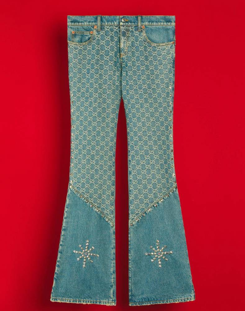 The bootcut jeans with GG pattern and studs from the Palace x Gucci collection 