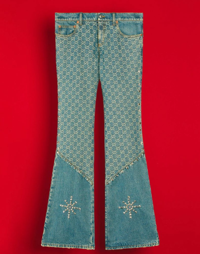 The bootcut jeans with GG pattern and studs from the Palace x Gucci collection 