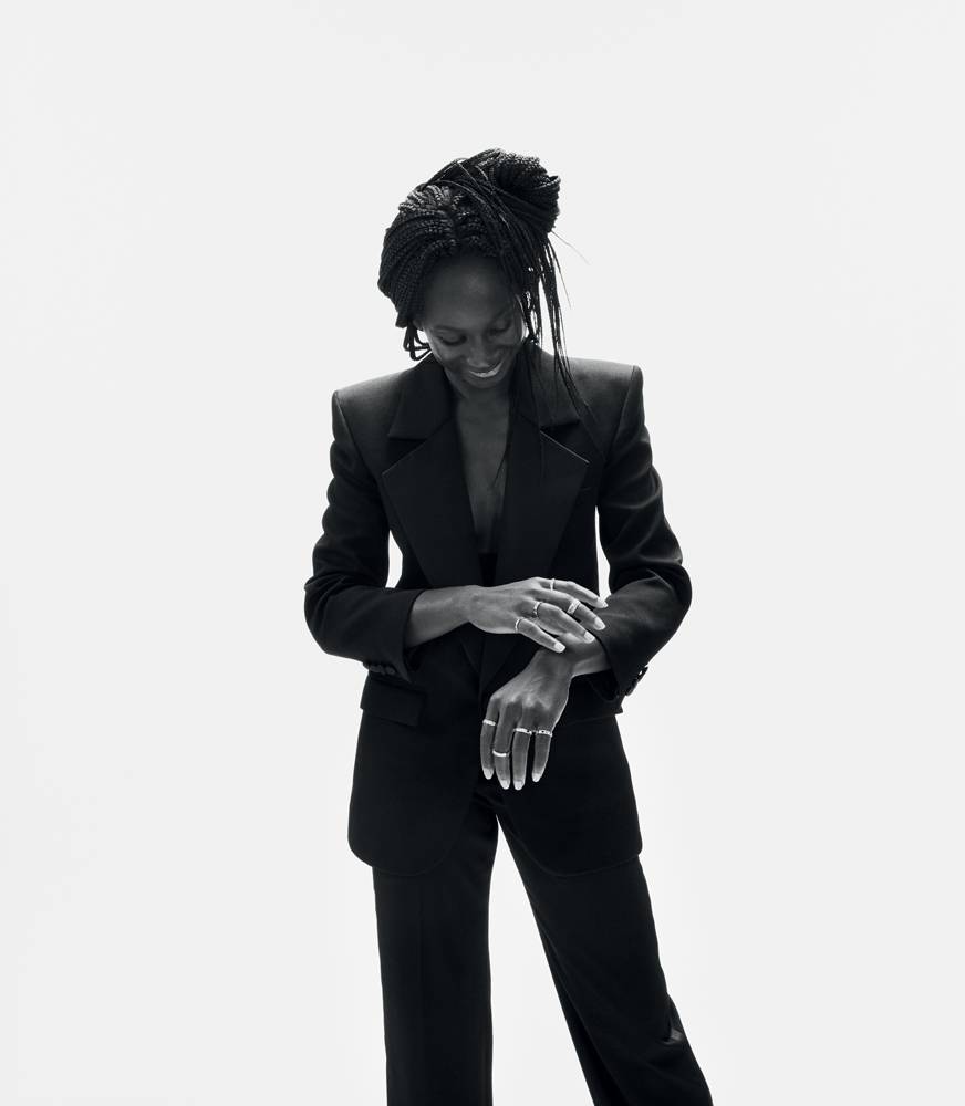 Eye Haïdara was wearing a jacket and trousers, SAINT LAURENT PAR ANTHONY VACCARELLO.  Ring 