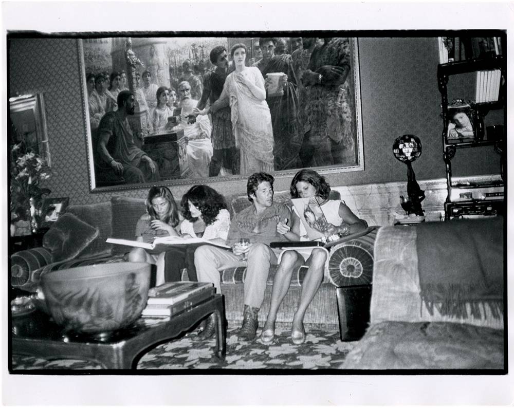 Bob Colacello, “Sylvia Martins, Diane von Furstenberg, Richard Gere and Barbara Allen at Diane von Furstenberg's, New York” (1980). © Bob Colacello. Courtesy of the artist.
