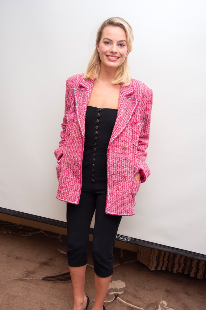 Margot Robbie in a Chanel jacket at the Mary, Queen of Scots press conference at the Four Seasons on November 16, 2018 in Beverly Hills, California. Photo by Vera Anderson/WireImage via Getty Images