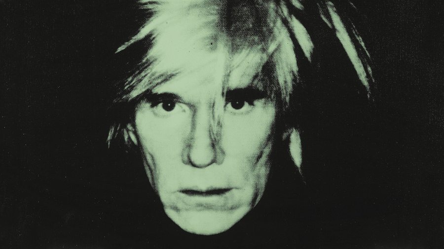 Which actor is going to portray Andy Warhol in an upcoming biopic?