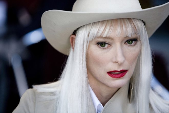 “The Limits of Control”, 2009. More peroxide than normal, Tilda Swinton sparkles in white in the role of Blonde for Jim Jarmusch’s thriller. She sports a long almost white mane and her diaphanous skin is adorned only with a dash of scarlet lipstick. 