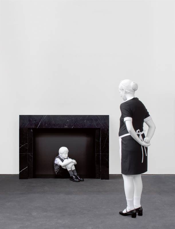 From left to right "Invisible" (2017). Bronze, marble, wood, lacquer and clothing, 125 x 86 x 45 cm (fireplace) and 62 x 26 x 64 cm (little boy). Works exhibited at the Whitechapel Gallery.