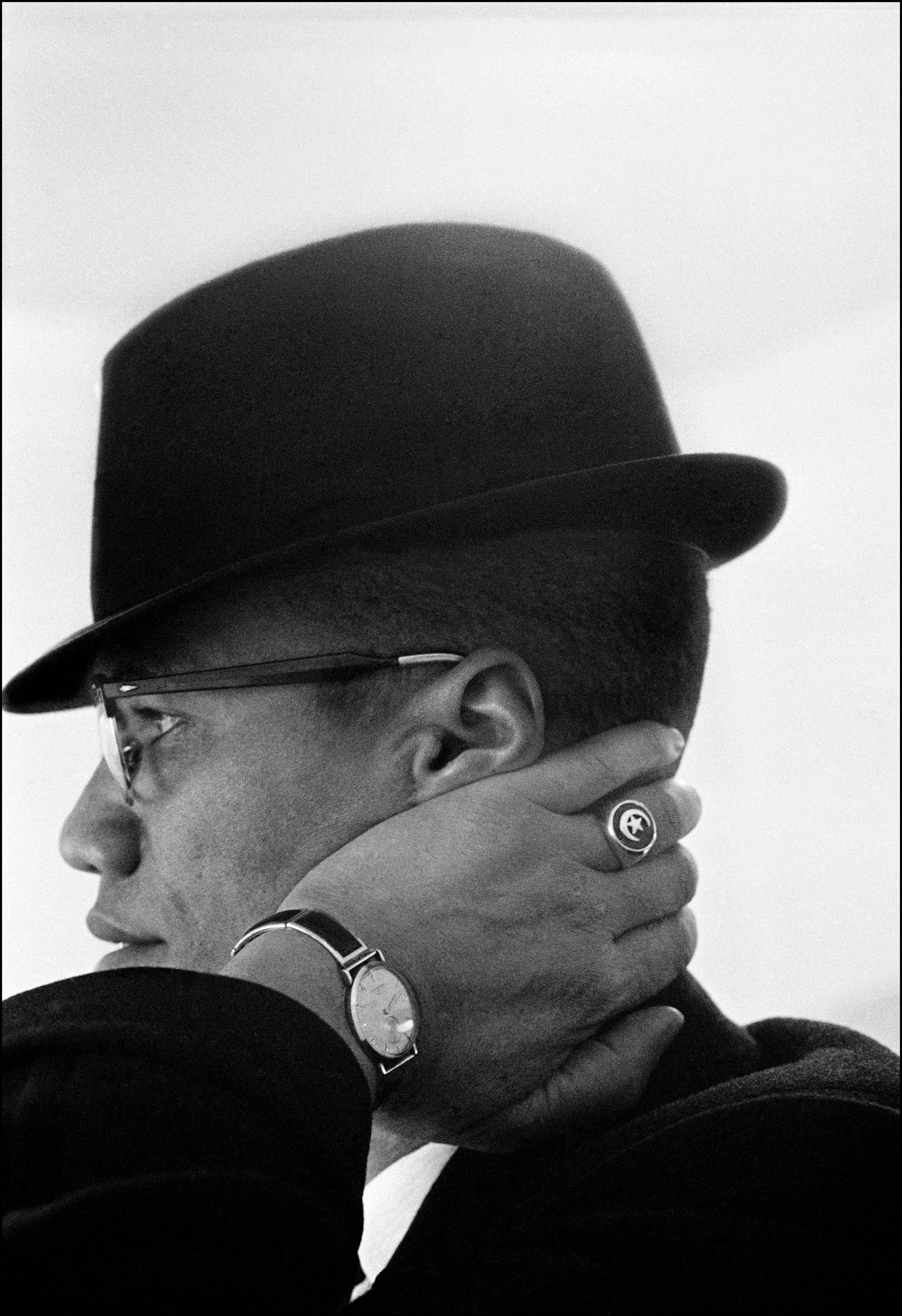 Eve Arnold, USA. Illinois. Chicago. Malcolm X during his visit to enterprises owned by Black Muslims. 1962. Magnum