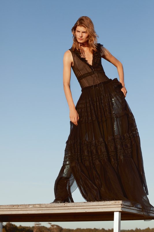 Pleated cotton long dress and sequined leggings, DSQUARED2. Ankle boots, GIUSEPPE ZANOTTI.