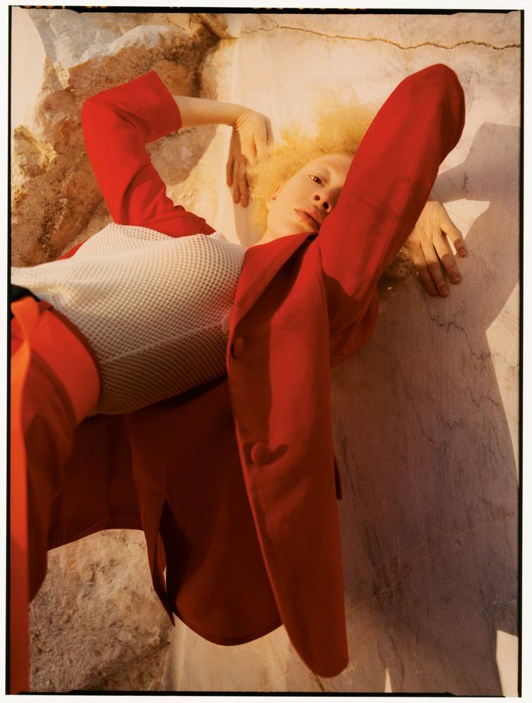 <p>Jacket and trousers, ERMANNO SCERVINO. Tank top, MISSONI. Belt, MERT & MARCUS 1994 X DSQUARED2.</p>
