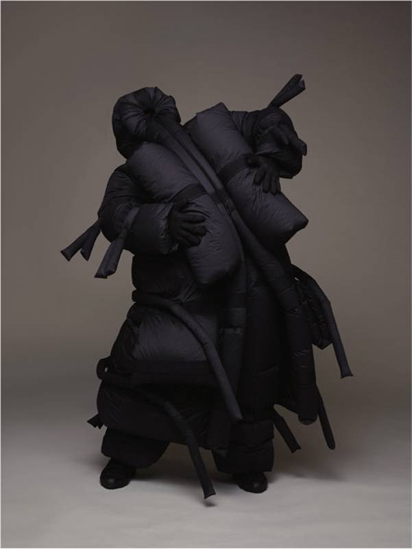<p>Nylon jacket, trousers and sneakers, 5 Moncler Craig Green. Vintage gloves. </p>

