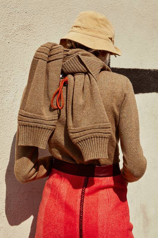 <p>Cashmere sweater dress, wool and cashmere skirt, HERMÈS. Wool trousers, DRIES VAN NOTEN. Bob, LACOSTE.</p>
